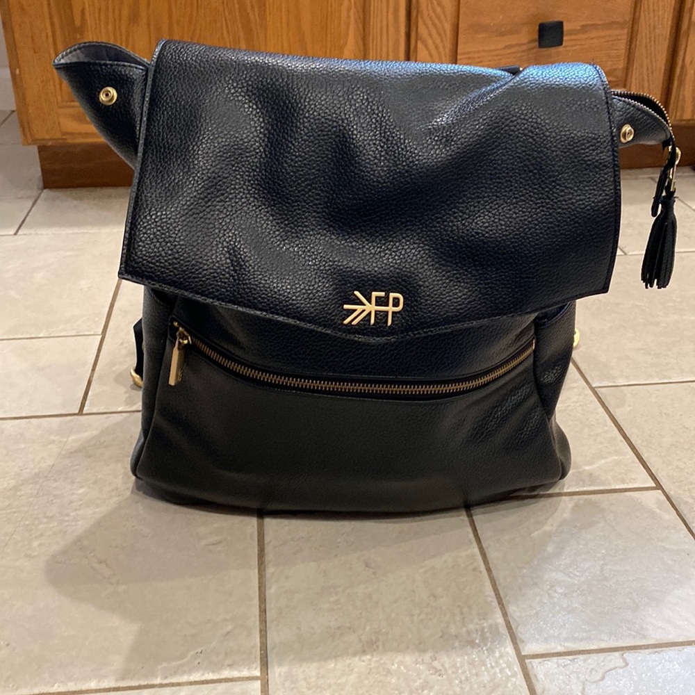 Black freshly picked backpack diaper bag. IUC